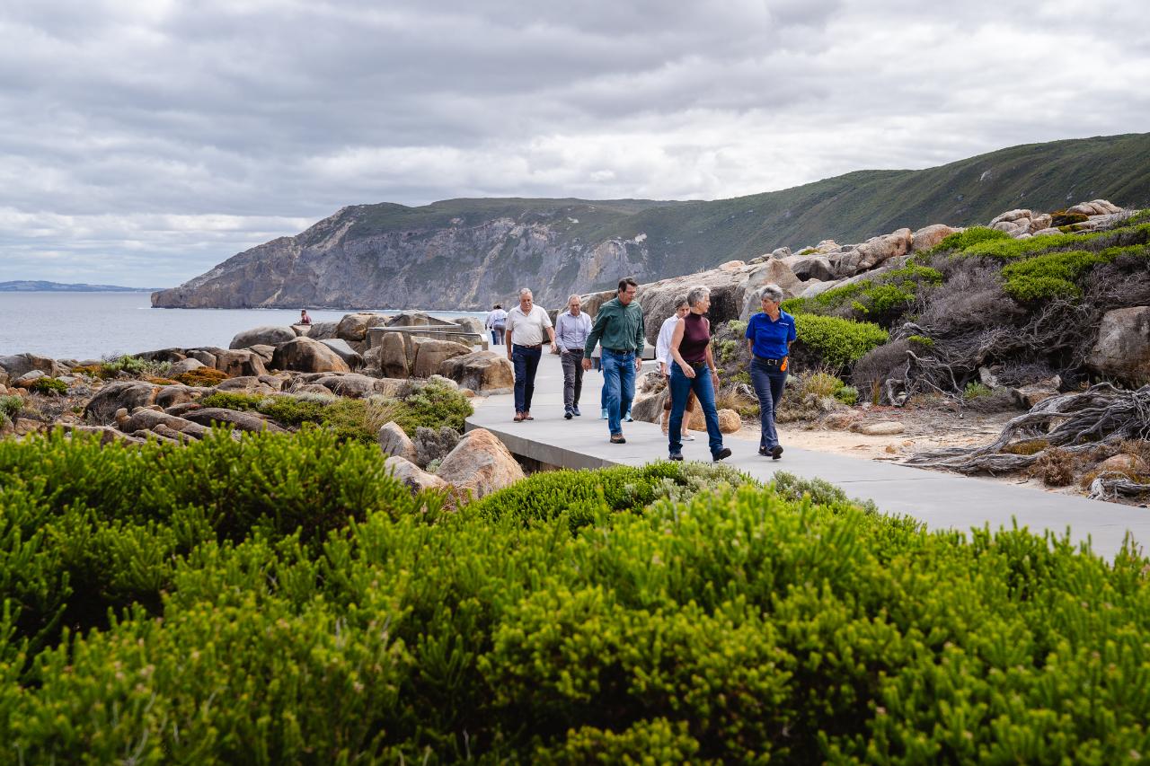 Albany Tours guests walking the coastal boardwalk at The Gap with a local guide