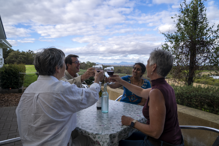 169 guests chinking glasses with view to stirling ranges ironwood estate wines gsp albanytours baseimagery porongurups western australia 1200x 800