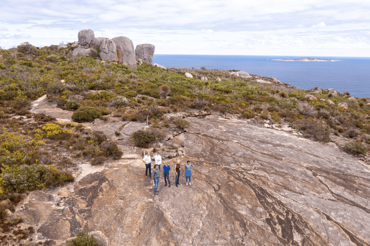 125 group on granite with southern ocean backdrop stony hill gnw albanytours baseimagery albany western australia 1200x744 (1)